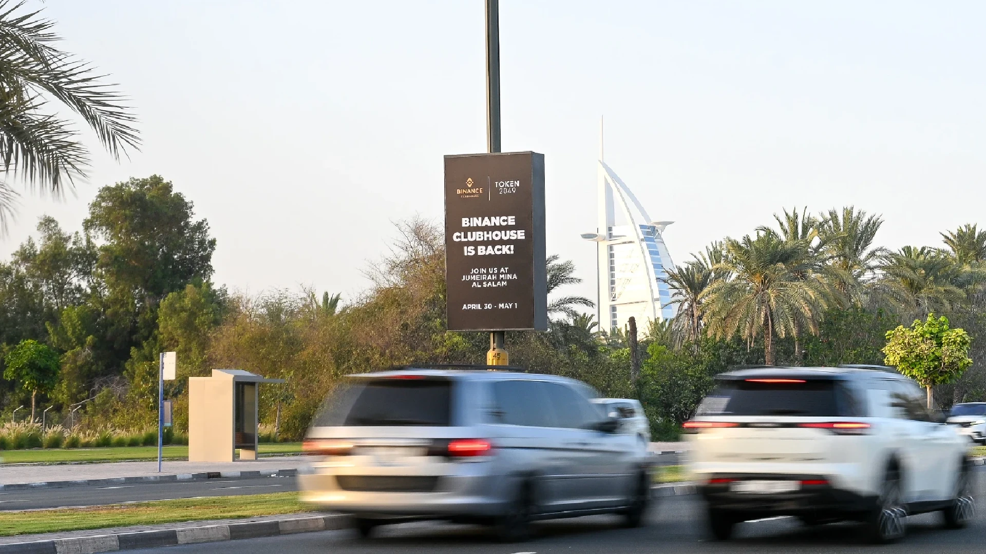 Binance Lampposts for TOKEN2049 with the Burj Al Arab in the background